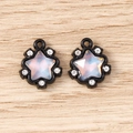 Macro view of star-shaped pendants with opal-like stones and sparkling small rhinestones - 5 Pieces / Black and Blue