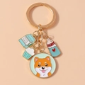Portachiavi cane dorato alla moda con ciondoli smaltati a forma di latte e cupcake - Etichetta Rotonda Shiba Inu