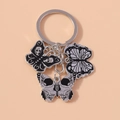 Gothik Schmetterling Schlüsselanhänger mit Totenkopf und schwarz-weißem Tropföl Design - Totenkopf Schmetterling