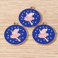 Three circular enamel fairy charms with golden stars on a natural wood surface background - 10 Pieces Pack / Star Fairy