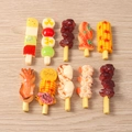 Set of 10 realistic 3D resin food charms featuring BBQ skewers and seafood on wood background - Mixed BBQ Skewers / Set of 4
