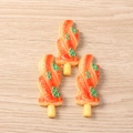 Detailed macro view of resin food charms shaped like grilled skewers with sauce and scallions - Roasted Tenderloin / Set of 4