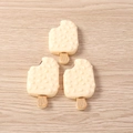 Detailed top view of realistic cream white resin ice cream charms with wooden sticks - Set of 4 / Yellow