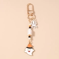 Detail of Halloween keychain with spooky ghost, spider charms and festive beaded chain - White Halloween Ghost Spider