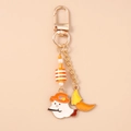 Detail of banana spider keychain with enamel ghost and orange moon pendant charm - Moon Ghost Beaded Style
