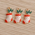 Detailed view of three festive Christmas sock pendants with enamel and zircon for jewelry DIY - 10 Pieces Pack / Christmas Rhinestone Sock