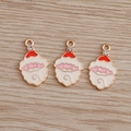 Detail of three Santa Claus charms with red enamel and rhinestones on wood background - 10 Pieces Pack / Red Cap Santa with Rhinestone
