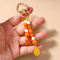 Detail van Halloween spinketting met kralenband en hartvormige metalen springhaak - Halloween Spin Ei