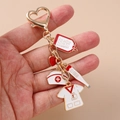 Krankenschwester Schlüsselanhänger mit Herzclip, Thermometer und medizinischen Anhängern - Herz Thermometer Uniform Stil