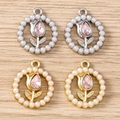 Detail of tulip flower charms with pink rhinestones and pearls on wood background - Round Rhinestone Tulip - Mixed Color / 5 Pieces