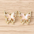 Close-up of iridescent butterfly pendants with rhinestones and gold metal finish - Hollow Butterfly / 5 Pieces / Gold Pink