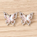 Detail of rhinestone butterfly charms with iridescent wings on light wood background - Hollow Butterfly / 5 Pieces / Silver Pink