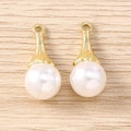 Close-up of white round pearl charms with gold metal caps for jewelry making - Water Drop Style / 5 Pieces / Gold