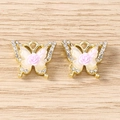 Macro shot of gold-plated butterfly charms with rhinestones and pink resin rose flower for DIY - Rose Butterfly / 5 Pieces / Gold Purple