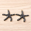 Zwarte zeester hangers met witte stippen en gouden rand voor DIY sieraden - Goud Zwart Zeester