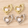 Close-up of gold and silver irregular heart charms with pearls on wood background - Irregular Heart / 5 Pieces / Multicolor