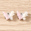 Close-up of gradient resin butterfly pendants with silver rings for DIY jewelry - Flower Butterfly / 5 Pieces / Silver Pink