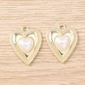 Detailed view of heart-shaped gold pendants with pearls and textured vintage edges - Large Pearl Heart / 5 Pieces / Gold
