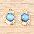 Detail view of gold moon and blue star charms with rhinestones and faux pearls for DIY jewelry - Gold Base - Dark Blue