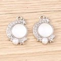 Detailed close-up of crescent moon charms with rhinestones, stars and pearls for DIY jewelry - White K Base - White