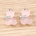 Ciondoli a forma di orso in resina rosa con fiocco in argento per gioielli fai da te - 5 Pezzi / Rosa argento
