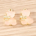 Cinque pezzi di simpatici ciondoli a forma di orso rosa traslucido con fiocco d'oro per gioielli - 5 Pezzi / Polvere d'oro