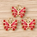 Tres colgantes de mariposa dorada con diamantes de imitación rojos y esmalte fino - Paquete de 10 / Rojo