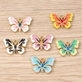 Set of ten colorful enamel butterfly charms with gold-plated edges for DIY jewelry making - 10 Pieces Pack / Mixed Color Butterfly