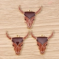 Detailed macro view of western buffalo skull enamel pendants for DIY jewelry design - 10 Pieces Pack / Brown Bull Head