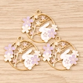 Detail showing three enamel rabbit and sakura pendants with golden metal edges for jewelry DIY - 10 Pieces Pack / Purple Flower Rabbit Ring