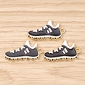 Three gold-plated football shoe pendants with black and white enamel for DIY jewelry - 10 Pieces Pack / Black