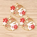 Detailed macro view of three golden bunny and cherry blossom enamel charms for DIY jewelry - 10 Pieces Pack / Red Rabbit Flower Ring
