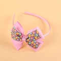 Pink Easter egg print headband with double bow design for young girls' hair styling - Pink