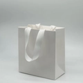 Minimalist white paper gift bag with textured ribbon handles for jewelry storage box - White Tote Bag; 14*15*7cm