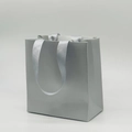 Elegant silver-grey matte paper gift bag with matching satin ribbon handles for jewelry - Grey Tote Bag; 14*15*7cm