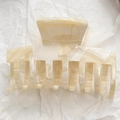 Short acetate claw clip in cream beige marble pattern for stylish hair styling - 7.5cm / Beige