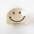 Minimalistische beige Acryl Haarklammer in Halbmondform mit schwarzem Smiley-Muster - Beige