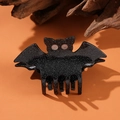 Pince à cheveux chauve-souris gothique avec paillettes argentées sur fond orange - Chauve-souris Noire