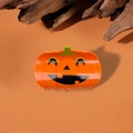 Halloween pumpkin hair claw clip in bright orange with a classic jack-o-lantern face design - Happy Pumpkin