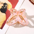 Pince à cheveux papillon en acétate marbré rose et blanc avec bordure dorée élégante - Rose Fleuri