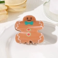 Cute gingerbread man hair claw clip with festive Christmas design for ponytail styles - Gingerbread Man