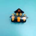 Halloween haunted house hair claw clip in black and orange colors with glossy finish - Ghost House with Orange Windows