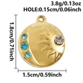 Macro view of 18k gold plated sun and moon pendant with blue and clear rhinestones - Gold (S3172-G-Z)