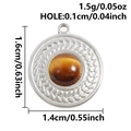Macro detail of round tiger eye stone pendant with wheat pattern in silver finish - Silver Base Tiger Eye Woven Edge (S3252-S-Gray)