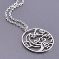 Macro shot of silver hollow-out moon and star pendant with sleek stainless steel chain - Necklace Set / 50cm / Steel