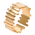 Detail view of gold adjustable titanium ring with unique architectural ribbed texture layers - Gold
