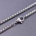Close-up of 2.5mm stainless steel box chain necklace with durable lobster clasp detail - 20cm / Silver
