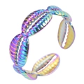 Macro detail of rainbow iridescent titanium steel ring with shell texture and wave design - Rainbow