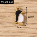 Macro view of penguin enamel charm pendant showing 15mm height and 7mm width dimensions - 10 Pieces Pack / Penguin