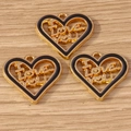Close-up of golden and black enamel heart pendants with I Love You cutout design - ILOVEYOU Heart Style / 10 Pieces Pack / Black